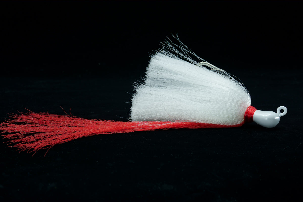 Skimmer Flair Hawk lures with white Head, white body and red tail.. This gulfstream lure is great as snook lure, snook jig, Tarpon Lure, Tarpon Jig, Cobia Lure, Cobia Jig, Bottom Jig and more. It is very effective both a near shore and offshore saltwater lure
