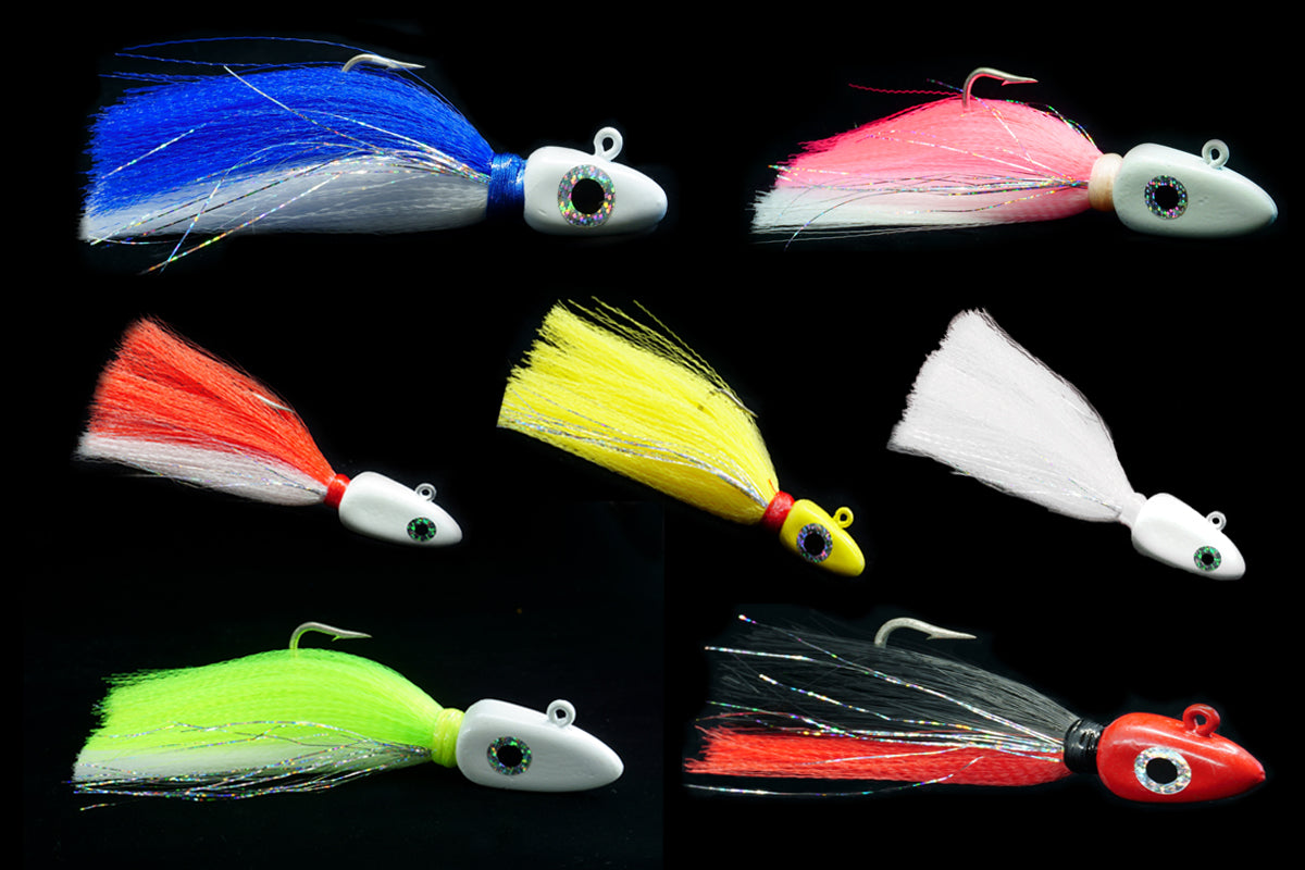 gulfstream lures, collection of different colored  Arrowhead lures,  saltwater lures, fishing jigs, grouper lures,  snapper lures, amberjack lures, cobia lures, kingfish lures, saltwater jigs, arrowhead jig, bottom lures, bottom jigs, 