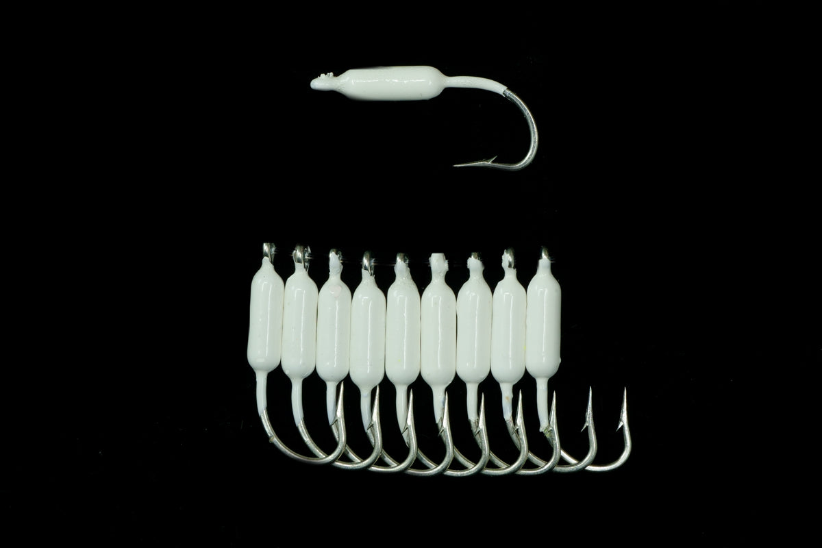 White Reef Seas Pieces in Packs of 10, Best yellow tail lure, also used as a mangrove snapper lure, reef fish lure, baitfish lure when baited with small pieces of shrimp, belly strips or silver sides. By gulfstream lures, saltwater lures, bait fish lures