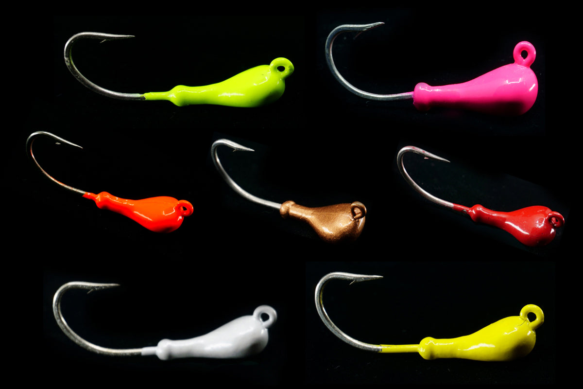 Collection of Troll Rite Jig Heads in various colors.  This Gulfstream Lures is very popular for using as a Flounder Jig, Jack Jig, Ladyfish jig, Pompano Jig, Red Fish Jig, Sea Trout Jig and Snook Jig. Saltwater Jig Heads.