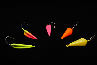 Collection of High Jinx jigs in assorted colors, gulfstream lures, pompano jig, pompano lure, bluefish jig, bluefish lure, mackerel jig, mackerel lure, bonefish jig, bonefish lure